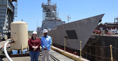 The ex-USS 
        
         undergoing refurbishment in a dry dock in Charleston in May 2022. The frigate will be called RBNS 
        
        in Bahraini service.