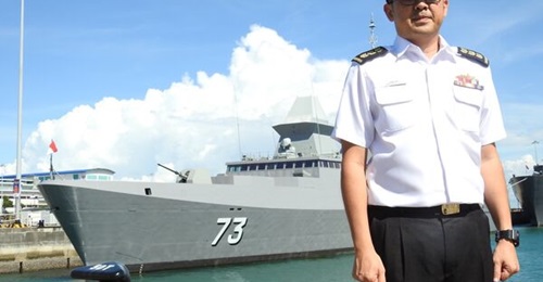 Commander of the Republic of Singapore Navy's First Flotilla Colonel Ng Kok Yeng Daniel at Changi Naval Base alongside RSS 
        
        - the ship he once served on.