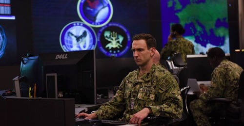 Sailors stand watch in the Fleet Operations Center at the headquarters of US Fleet Cyber Command/US Tenth Fleet (FCC/C10F).
