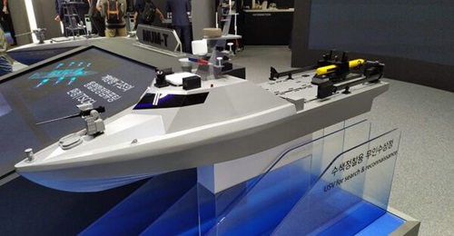 The Sea Ghost (above) can control up to four M-Searcher USVs operating in swarm.