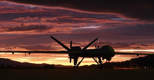 An MQ-9 Reaper sits on the flight line as the sun sets at Creech Air Force Base, Nevada, on 20 November 2019.