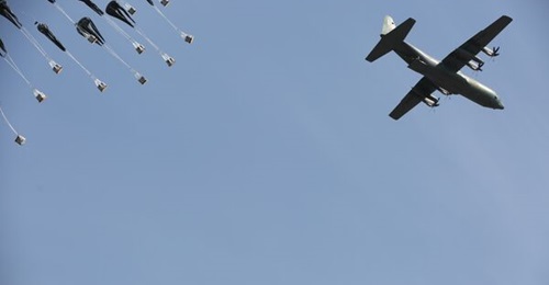 South Korea's Lockheed Martin C-130 fleet is a key component of its special forces' operations and deep infiltration and penetration. In this photo, a RoKAF C-130 drops five-gallon drums of water during a military exercise in South Korea in 2017.