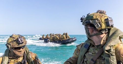 Australian Army soldiers from the 5th Battalion, Royal Australian Regiment, onboard F470 Zodiacs conduct small-boat training in the littoral environment during Exercise 'Tiger's Run 2022' on the Timor Sea off the coast of Northern Territory.