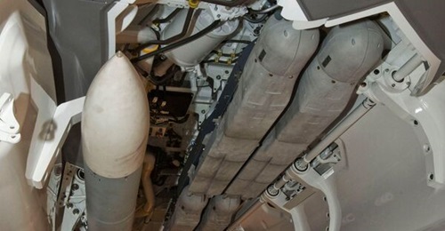 The F-35 demonstrating its ability to carry four SDB II bombs (plus an AIM-120 AMRAAM) in each of its two internal weapons bays.