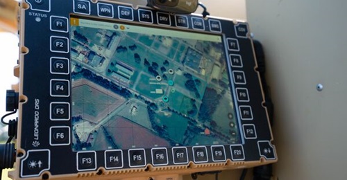 Systematic's SitaWare Frontline running on a DRS MFoCS tablet at the Everest experiment. The screen shows the common operating picture.
