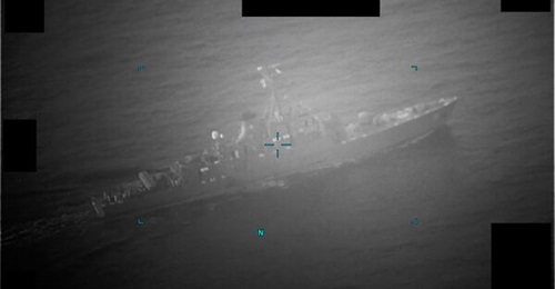 A still from surveillance footage released by the US 5th Fleet shows a naval vessel that can be identified as the Iranian corvette 
        
        . The 5th Fleet said it fired on the tanker 
        
        .