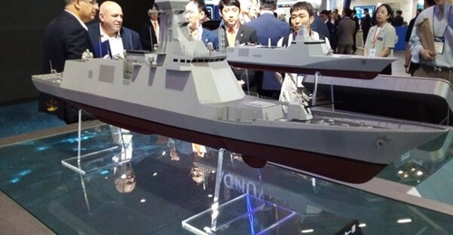 A model of the FFX-III frigate on display at Hanwha Ocean's exhibition stand during MADEX 2023.