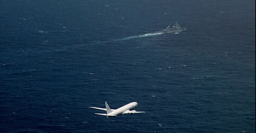 The image of a Royal Australian Air Force P-8A Poseidon aircraft overflying a Chinese Dongdiao-class intelligence ship, released by the Australian Department of Defence amid Exercise 'Talisman Sabre' 2023.