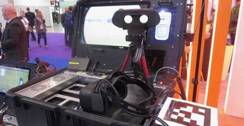 Inzpire's CASE mixed-reality JTAC trainer. Note the HMD with pass-through cameras, which can be used in conjunction with the emulated laser target designator. On the screen is a soft version of a DAGR.