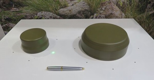 Raytheon UK's Landshield (left) and Landshield Plus (right) GPS defensive antennas displayed at the DSEI 2019 exhibition.