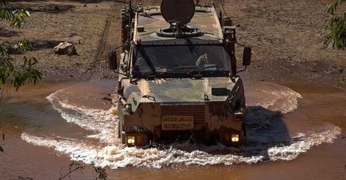Soldiers from the Indonesia National Armed Forces Peacekeeping Centre conduct driver training on the Bushmaster Protected Mobility Vehicle with the 5th Battalion, Royal Australian Regiment, Darwin, Northern Territory.