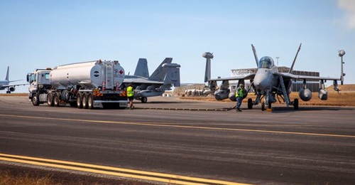 A refuel is conducted on a Royal Australian Air Force E/A-18G Growler at RAAF Base Darwin during Exercise 'Talisman Sabre 2023'.
