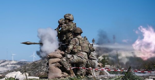 US Army soldiers, alongside Cypriot troops, fire a rocket-propelled grenade launcher during a bilateral training exercise in Cyprus in February 2023.