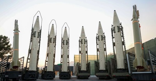 Six Iranian Khorramshahr ballistic missiles are seen flanked by Haj Qasem ballistic missiles during the handover ceremony.