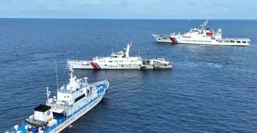 China Coast Guard vessels conducting what Manila claims to be an attempt to “block, harass, and intefere” its resupply mission to Second Thomas Shoal on 22 August 2023.