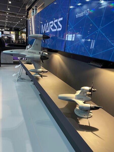 Displayed at DSEI 2023 is MARSS' Interceptor (left) and the new manportable variant - Interceptor Short Range (right).