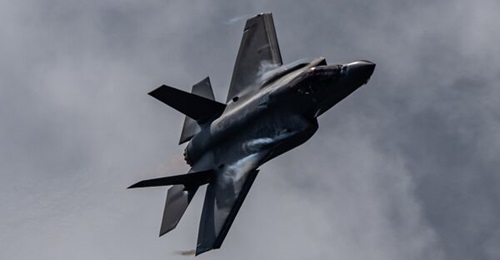 An F-35A flies over the Toronto waterfront on 5 September 2021 during the Canadian International Air Show. The Pentagon and Lockheed Martin have agreed to adjust expectations for future deliveries of the F-35, also known as a production rebaseline.