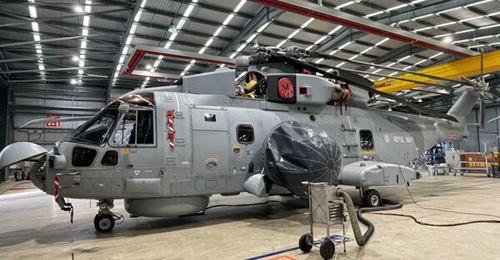 Pictured at the Royal Naval Air Station Culdrose on 5 September is one of two Crowsnest-configured Merlin HM2 helicopters from 820 NAS now embarked on HMS 
        
         for CSG23/Operation 'Firedrake'.