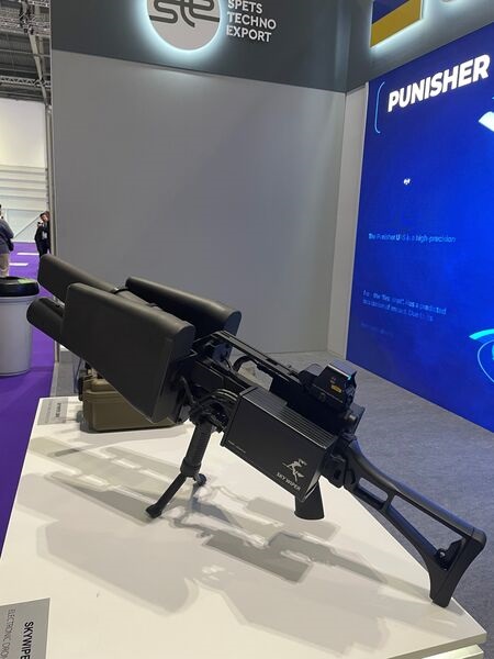 The Skywiper EDM4S C-UAS handheld jammer, displayed at DSEI 2023 in London, is widely used by the Ukrainian army. Its dimensions are 1,045 (L) × 350 (H) × 250 (W) mm.