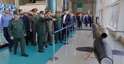 Russian Defence Minister Sergei Shoigu is shown a '351 land-attack cruise missile' at Iran's IRGC Aerospace Force museum in Tehran.