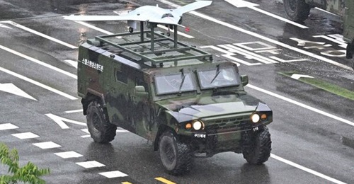 A South Korean military KIA Light Tactical Vehicle carries a stealth unmanned aerial vehicle during the 75th Armed Forces Day on 26 September.