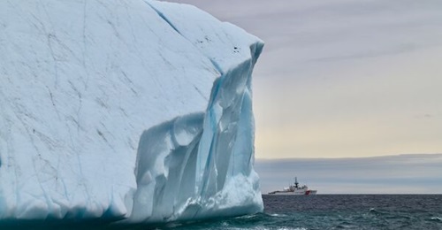 US Coast Guard Cutter 
        
         (WMEC 911) steams near an iceberg in the Atlantic in support of 'Operation NANOOK'.