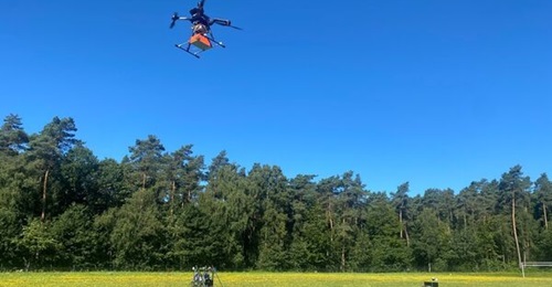 A quadcopter co-ordinating autonomously alongside a UGV in a de-mining exercise in Belgium in September 2023, supported by the European Defence Agency.