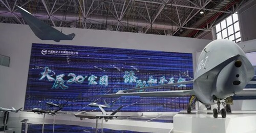 Aerospace prime AVIC showcased its WZ-7 high-altitude long endurance UAV for the first time. Seen suspended from the rafters is a scale model of its supersonic WZ-8 UAV.