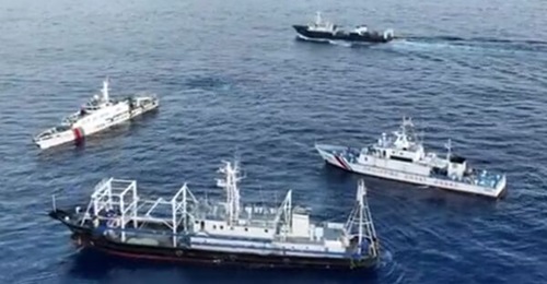A screenshot from a Philippine Coast Guard video showing a confrontation between Chinese and Philippine vessels in the South China Sea on 22 October.