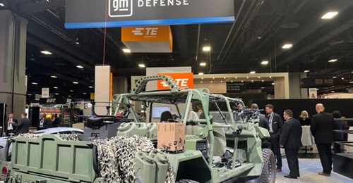 GM Defense displays a mission power system on the back of an infantry squad vehicle. It can power one of Hoverfly's unmanned aerial vehicles, pictured on the back of the vehicle.