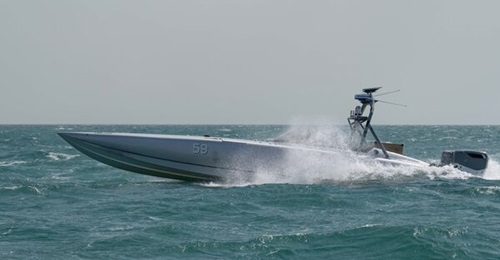 The US Navy fired its first live munitions from an unmanned surface vessel during an exercise.