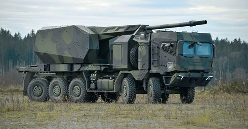 Rheinmetall MAN Military Vehicles HX3 seen fitted with a full-scale mock-up of its new remote controlled turret armed with a 155 mm/60 calibre ordnance in travelling configuration.
