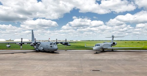 The first EA-37B Compass Call next to one of the EC-130Hs it is intended to replace.