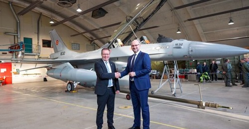 One of the first of 32 F-16s for Romania being handed over by Norway's defence minister on 28 November.