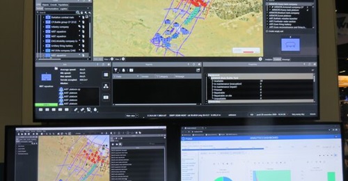 MASA's SWORD constructive simulation displayed at I/ITSEC 2023, with a general situation picture at the top, a range of KPI choices (bottom left), and the new web-based analytics dashboard (bottom right) showing crew states in different formats.