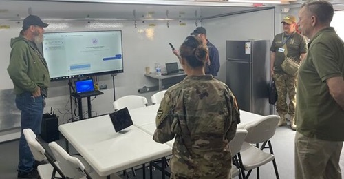 The 405th Army Field Support Brigade's Tele-Maintenance and Distribution Cell-Ukraine in Jasionka, Poland, briefs a Ukrainian defence official.