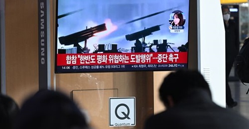 A news broadcast with file footage of North Korea's artillery firing, at a railway station in Seoul on 5 January 2024. North Korea fired more than 200 artillery shells near two South Korean islands that day, said the South Korean government.
