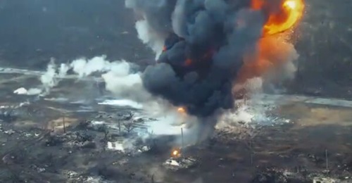 A screengrab from the 501st Separate Marine Battalion of the Armed Forces of Ukraine (Grifon 501) destroying a Russian armoured vehicle with a UAV, possibly an MBT or TOS-1 MLRS, because of the large explosion.