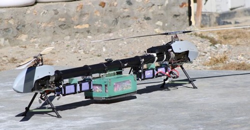 The Sabal-10 UAV is pictured in trials with a payload attached to the centre of its tubular fuselage.