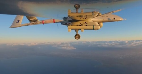 A Bayraktar TB2 carries a Desert Sting 16 guided bomb during an integration test flight.