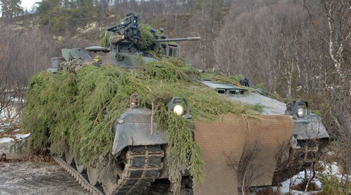 A German Army Marder 1A5 ready to engage a target with its EuroSpike MELLS anti-tank guided weapon mounted to the right of the 20 mm cannon.