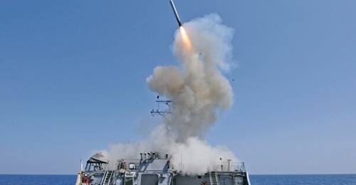 The Arleigh Burke-class guided-missile destroyer USS 
        
         is seen here launching a Tomahawk cruise missile. The JMSDF will soon be equipped with this capability.