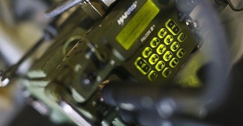 A legacy AN/PRC-117G Adaptive Networking Wideband Waveform aboard an MV-22 Osprey at Marine Corps Air Station Yuma, Arizona.