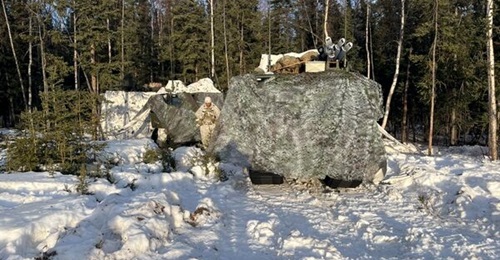 A convoy of Cold-Weather All-Terrain Vehicle perform command-and-control operations for the Joint Pacific Multinational Readiness Center training rotation in Fort Greely, Alaska.