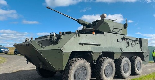 A Pandur 8×8 armoured personnel carrier fitted with the Cockerill 1030 MCT for trials.