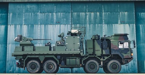 APS SKYctrl skid C-UAS with FIELDctrl 3D MIMO radar, CyView C2, and the Mk 44 Bushmaster II single 30 mm cannon.
