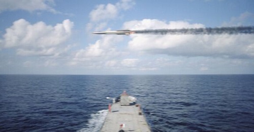 A GQM-163 Coyote target overflies a mobile ship target.