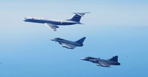 A Swedish Gripen and a German Eurofighter seen trailing a Russia Tu-134 during what was one of two maiden interceptions by SwAF combat aircraft since Sweden joined NATO the day before.