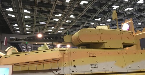 A QELF Boxer is seen fitted with a passive radio frequency sensor that enables it to identify the locations of UAVs so they can be engaged with its RCT30 turret.