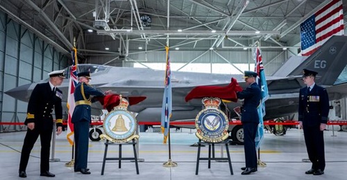 The chiefs of the RAF and RAAF reconstituting their respective 80 Squadrons during a joint ceremony at Eglin AFB in the US.